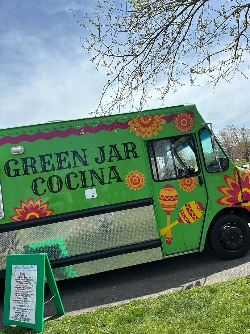 Green Jar Cocina food truck at a public park